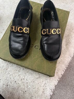 Gucci Black Leather Loafers with Gold Logo Strap